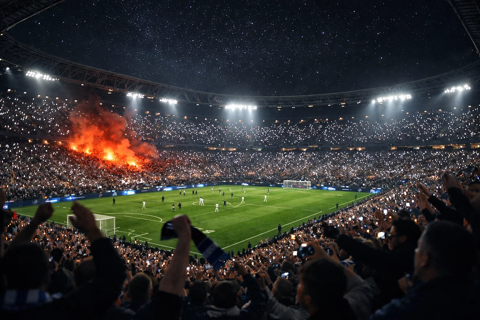 Supporters de football créant une mer de lumières avec leurs téléphones dans un stade européen lors d'une soirée de Champions League